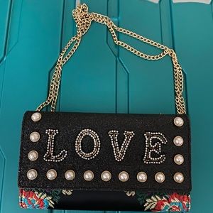 Used aldo cross body love bag